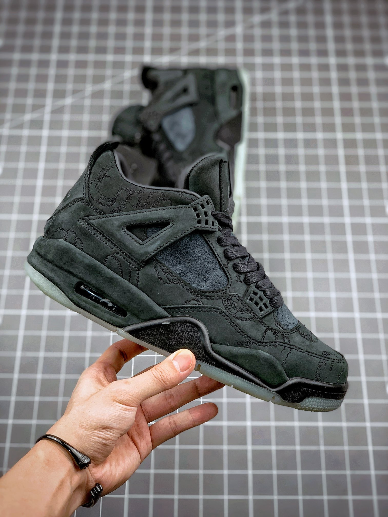 KAWS x Air Jordan 4 Black Black-Clear Glow For Sale