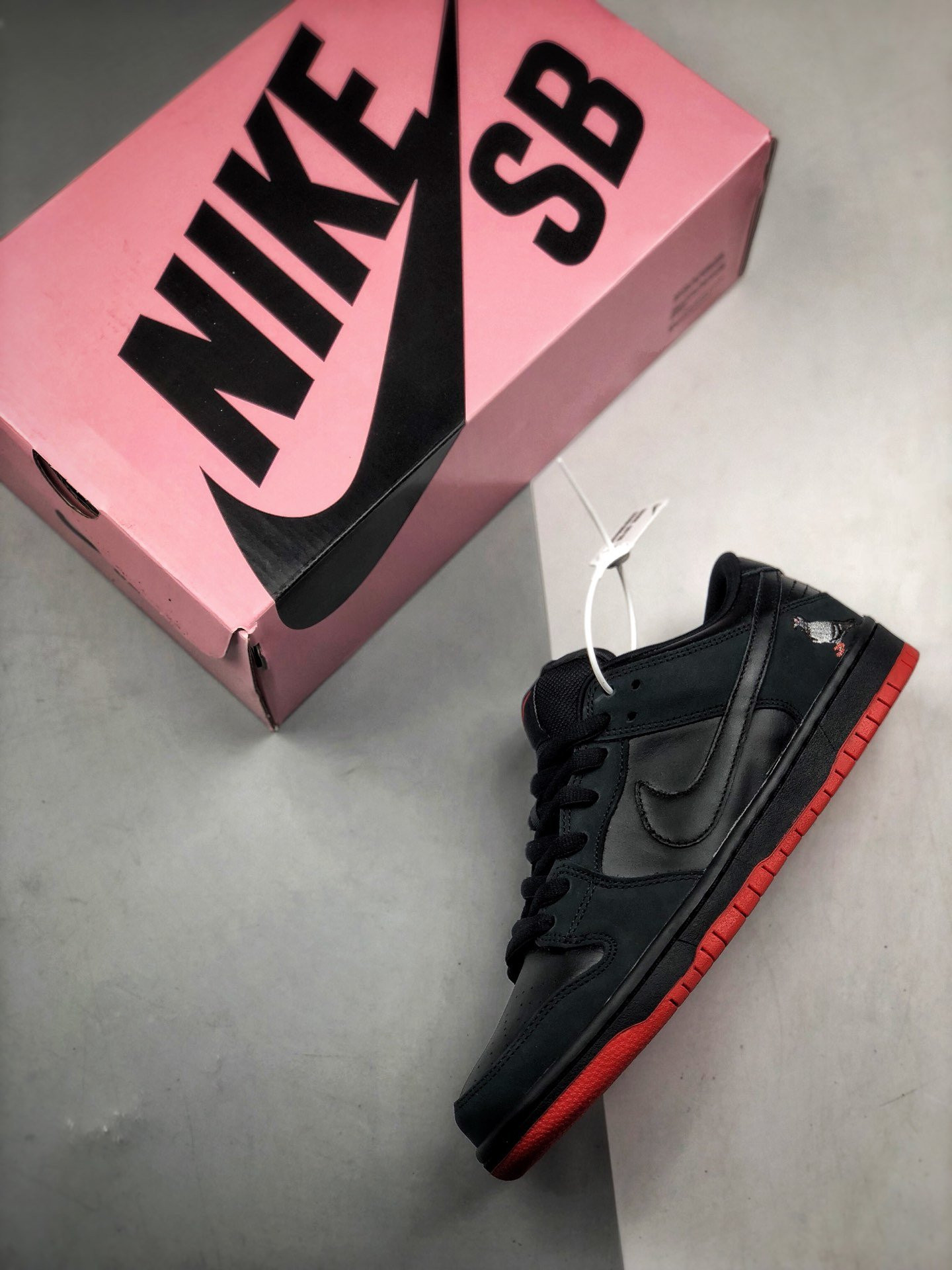 Nike SB Dunk Low Black Pigeon 883232-008 For Sale